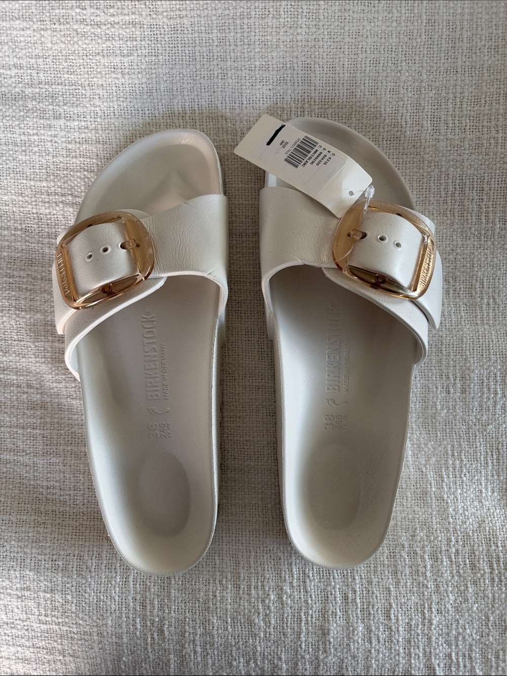 Birkenstock White Single Buckle Slide Sandals with Gold Buckles